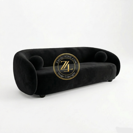 Modern curved Black Front velvet sofa with round cushions by Zauq Living Lahore