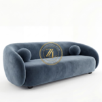 Modern curved blue velvet sofa with round cushions by Zauq Living Lahore.